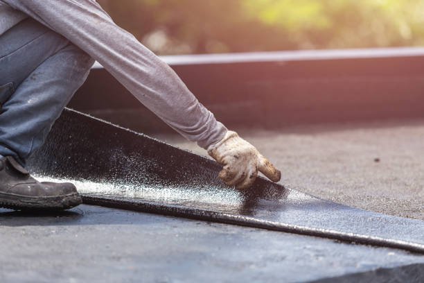 Professional Basement Waterproofing technician working in Twin Lake, MI